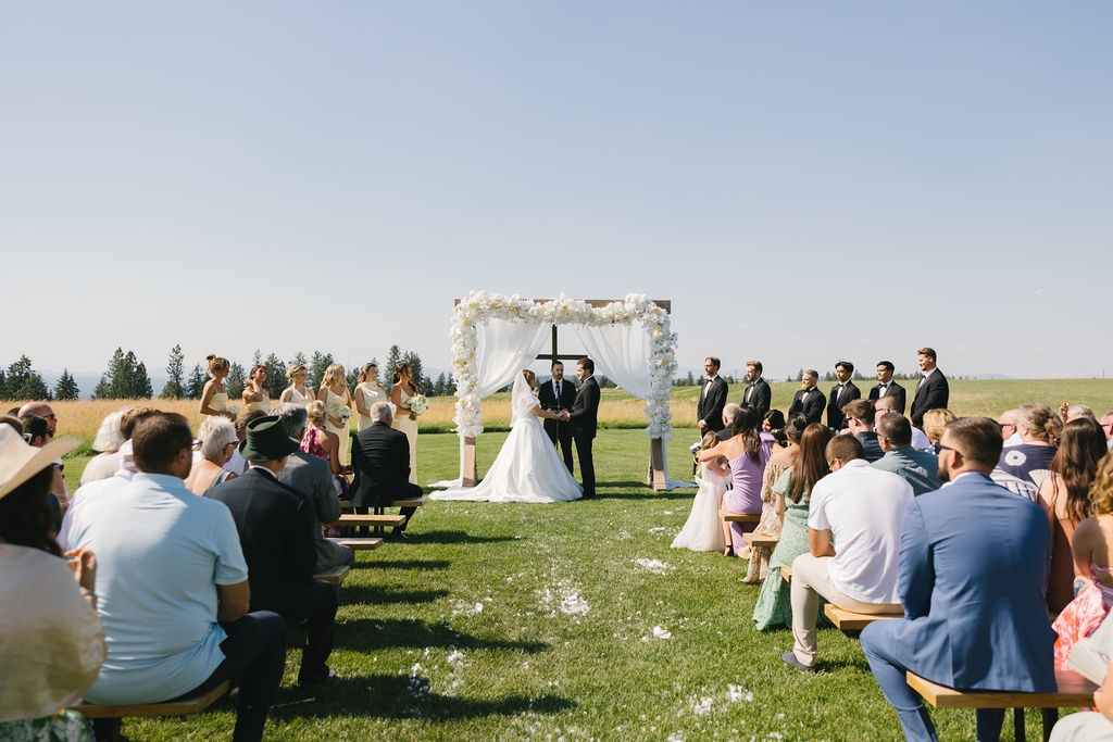 A view of a farmhouse on green bluff wedding reception taking place