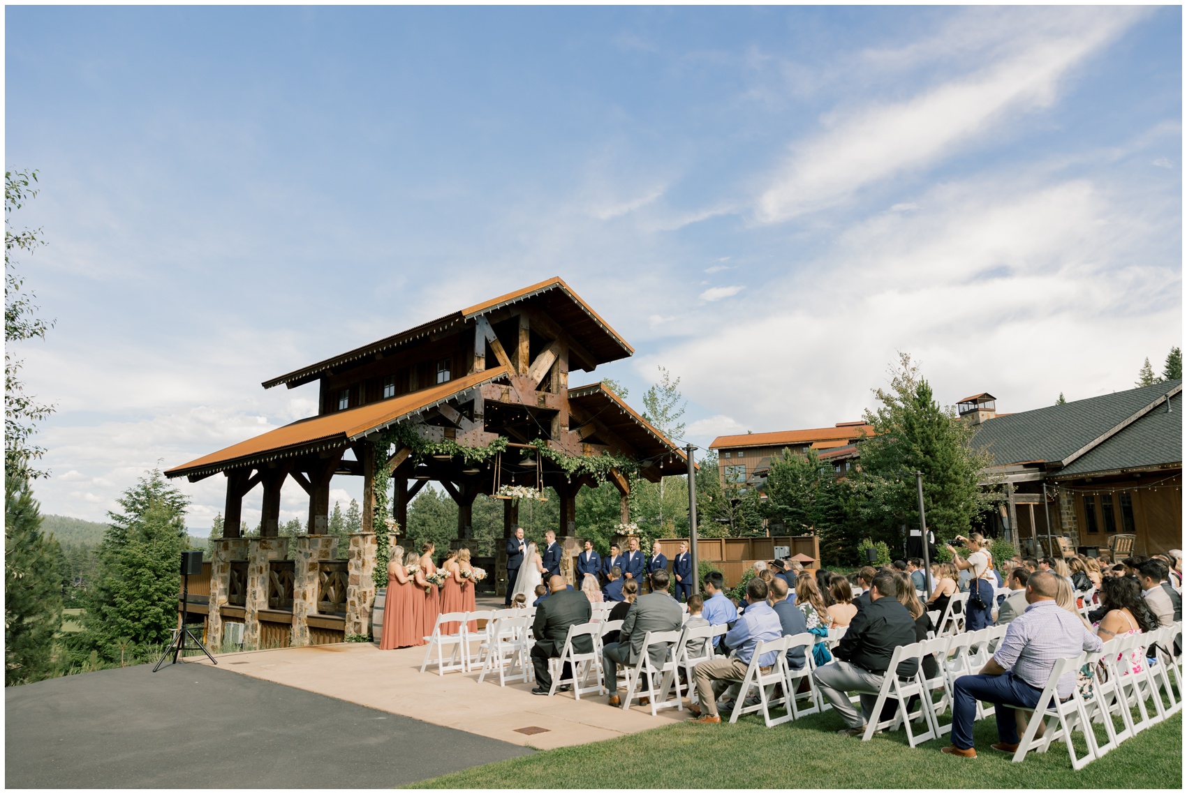 A view of an outdoor wedding ceremony at a winery